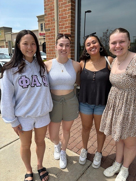 2025 grads join together at a celebratory lunch to mark their end of the year. (Shown Kaylin Chen, Adi Tanguay, Emily Thomas, as well as fir