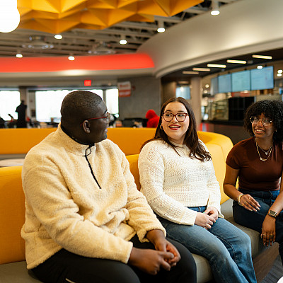 Three students visit the Institute for Student Success (ISS) in Lower Wismer to find extra academic support.