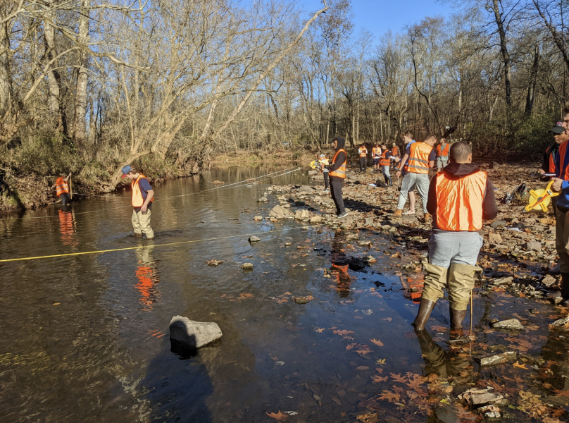 Geology: The Earth Around Us (ENVS/GEOL-102Q) students collect measurements to calculate streamflow measurements of the Skippack Creek, E...
