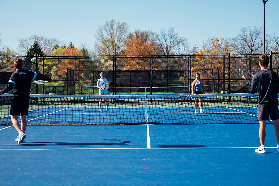 Tennis players rally at the Ursinus Tennis Courts.
