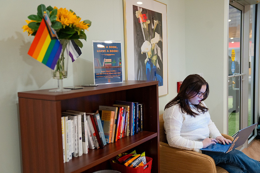 ISS student reading in waiting Area