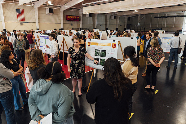 Students present their research findings in Floy Lewis Bakes Center. COSA is comprised of multiple sessions throughout the day-- this pho...
